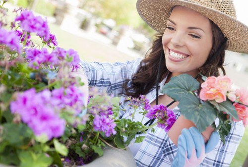 Front view of a gardener reviewing a garden plan
